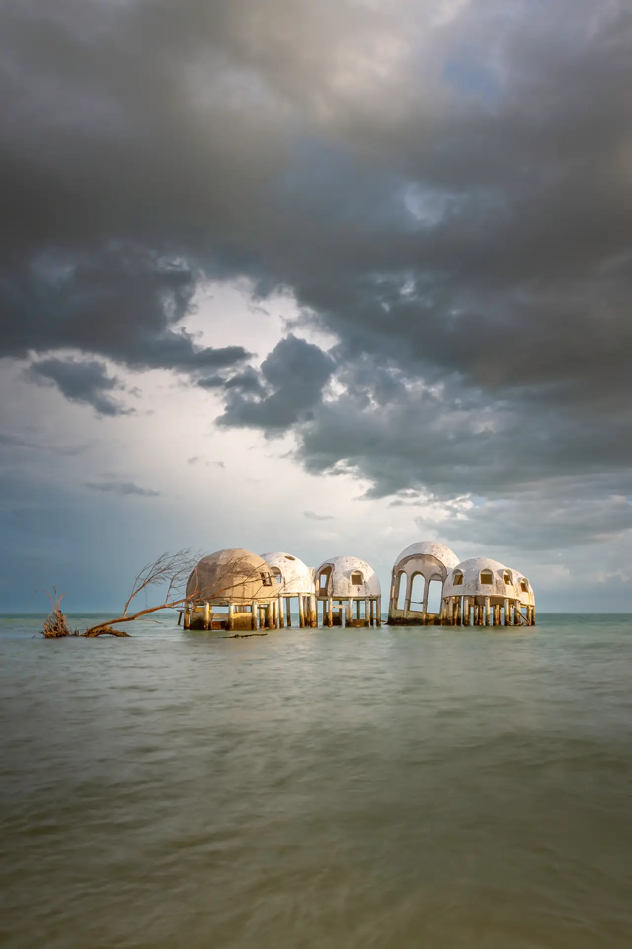 Abandoned domes in tranquil waters