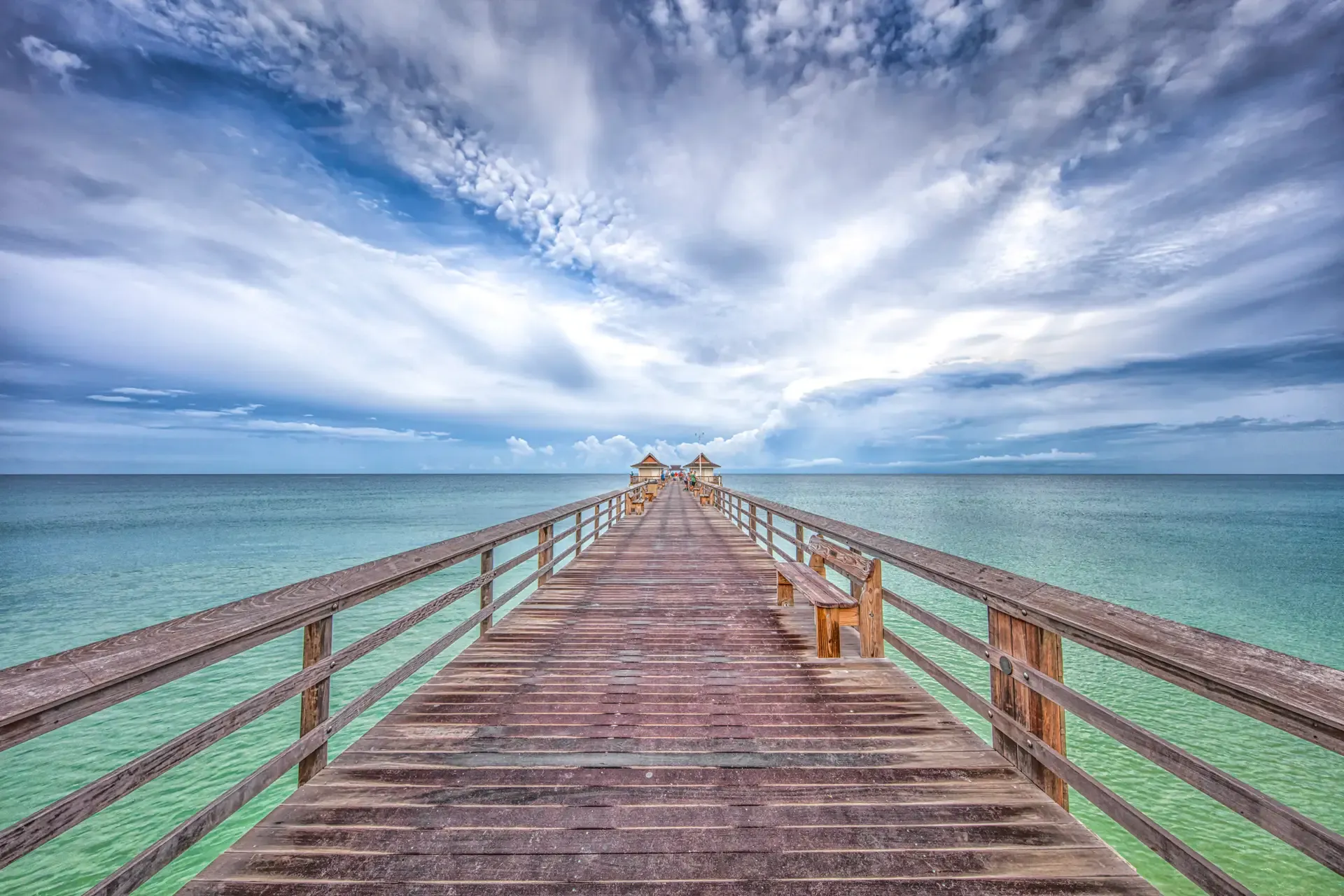 Naples Pier extending into calm ocean