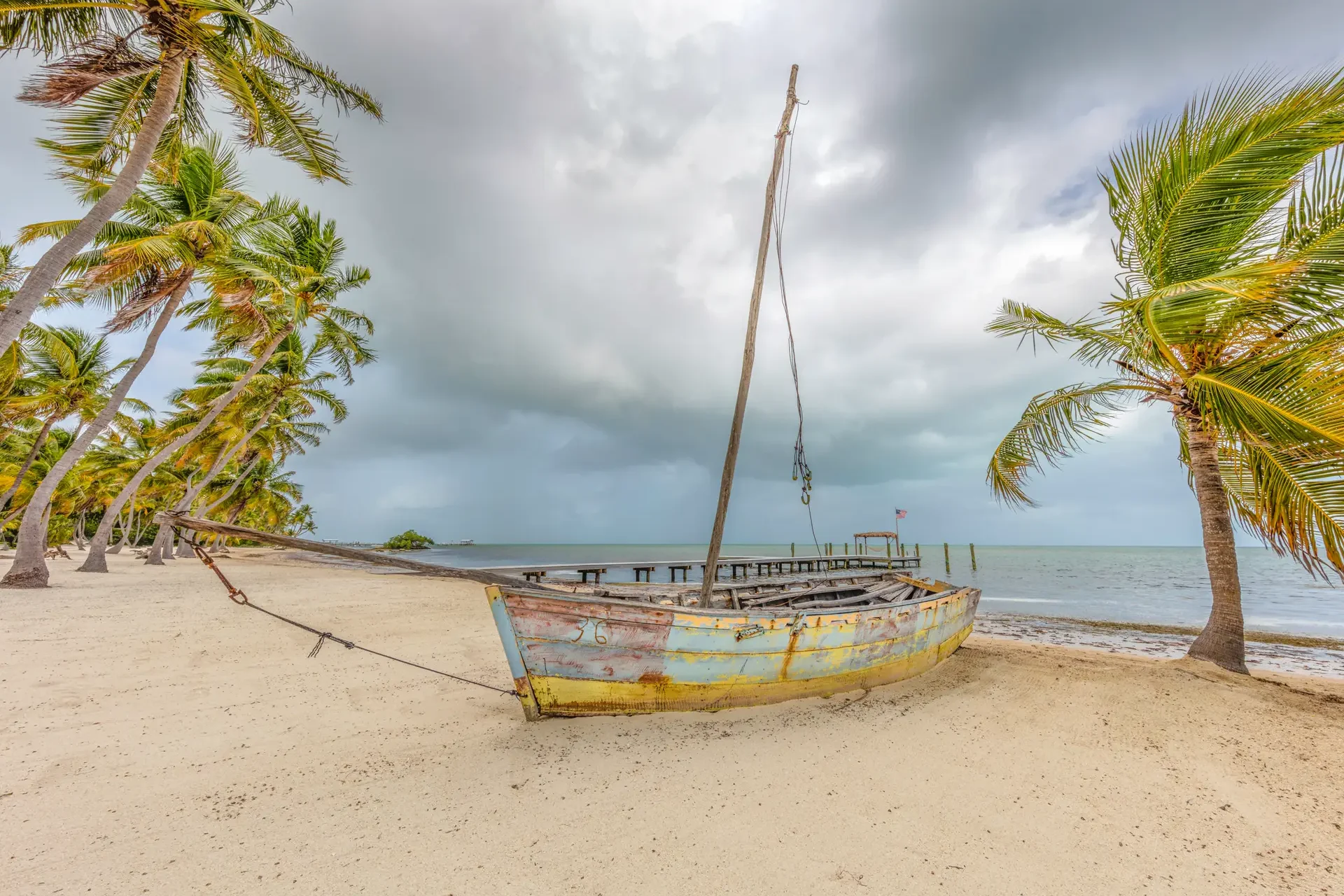 Abandoned boat on sandy beach