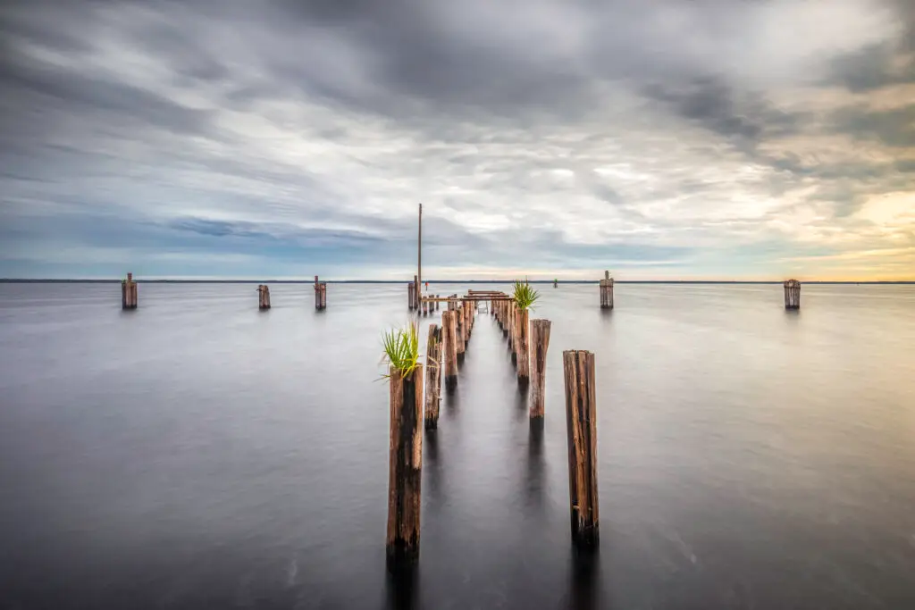 Serene pier extending into calm water