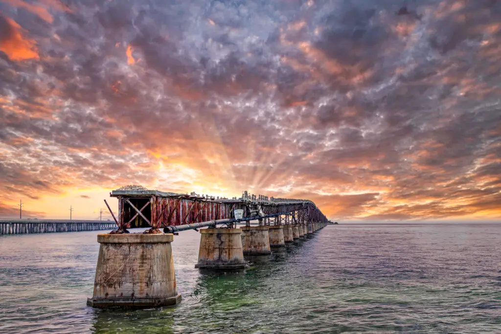 Sunset over a weathered pier